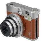 دوربین عکاسی چاپ سریع فوجی فیلم مدل Instax mini 90 Neo Classic همراه با یک بسته فیلم 10 تایی