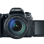 دوربین دیجیتال کانن مدل EOS 77D به همراه لنز 18-135 میلی متر USM و کیف دوربین سافروتو مدل H-201